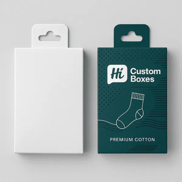 Two hanging tab boxes for socks one plain white one custom printed with Hi Custom Boxes branding class=