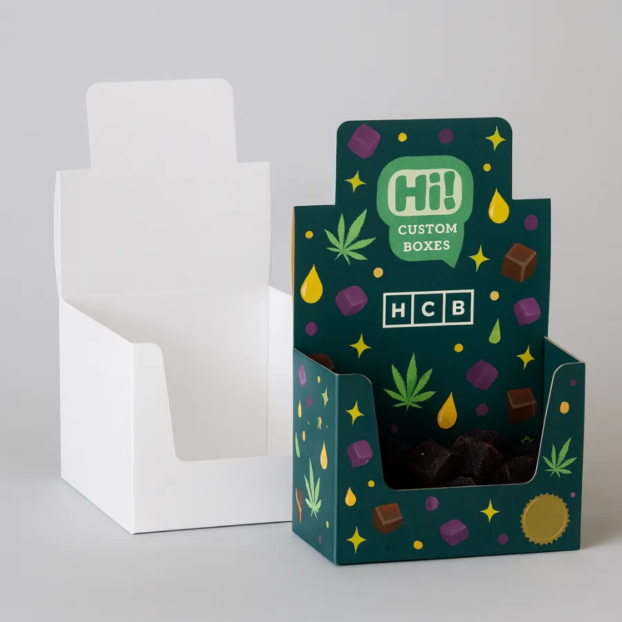 Two examples of display boxes for edibles- one plain white and one in a colourful design- shown with product inside- class=