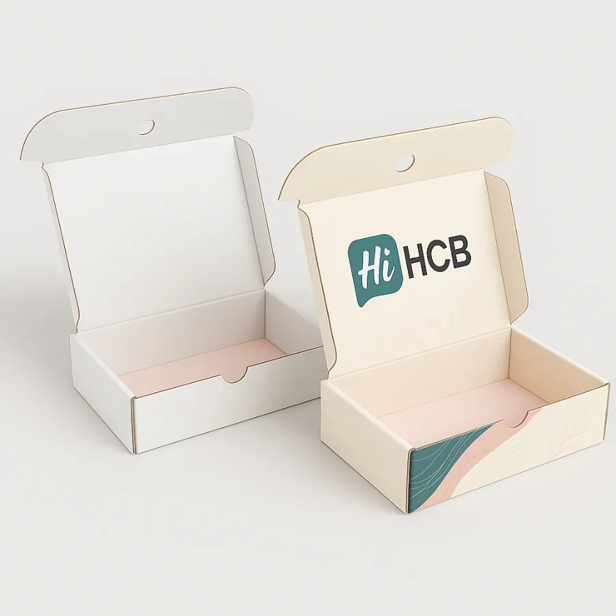 Luxury rigid flip-top box with pastel interior- plain version on the left and printed version on the right with HCB logo and decorative wave design- class=