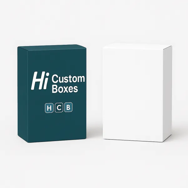 Two rectangular product boxes one plain white and one teal with HCB branding class=