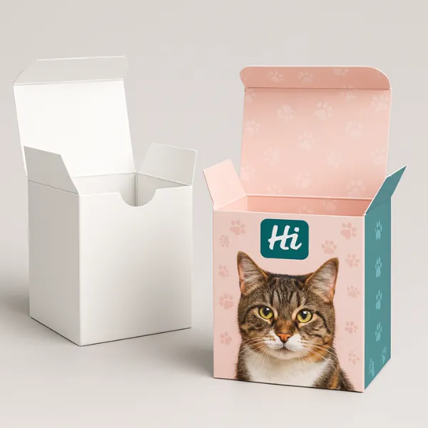 Open-top tuck-in cat treat boxes - one plain white- one printed with a brown tabby cat- pink background with white paw prints- and Hi logo- class=