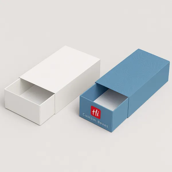Custom sliding drawer boxes in plain white and textured blue designs ideal for elegant product packaging class=