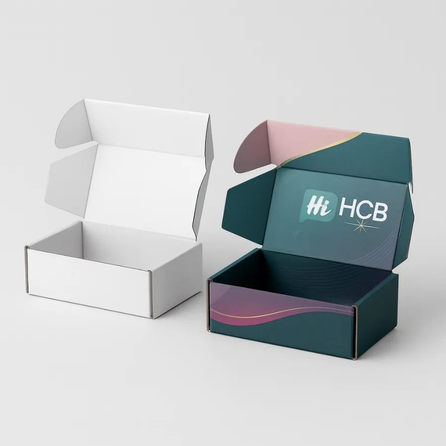 Corrugated mailer box- displayed in plain white on the left and custom-printed on the right with teal and pink wave graphics- Hi HCB logo- and branded interior- class=
