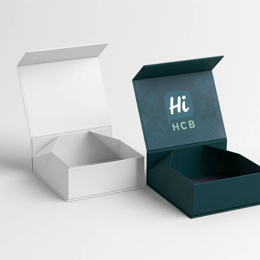 Open collapsible rigid magnetic closure boxes- One is plain white- and the other is a custom-printed dark teal with an all-over debossed pattern-