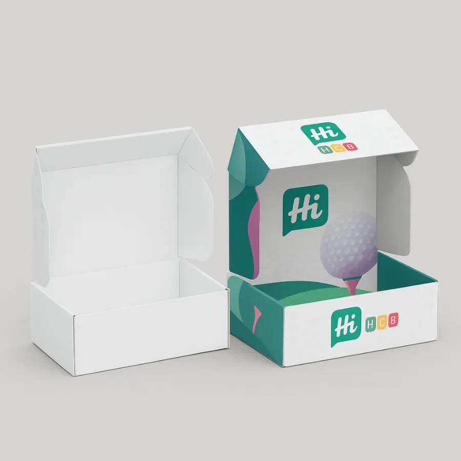 Pair of open mailer-style cartons- the left is blank white- the right features a playful golf-course illustration and -Hi HCB- logos printed inside and outside- class=