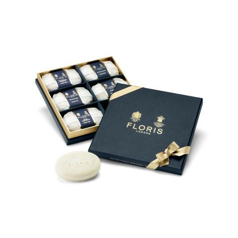 A luxury soap packaging box with gold ribbon