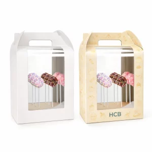 Two sliding drawer-style gift boxes, one plain white and one printed with teal wave patterns.