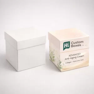 Two square lidded boxes, one solid white and one with peach tones and botanical illustrations.