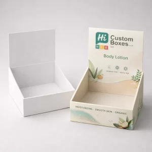 Two square lidded boxes, one plain white and one featuring a sophisticated peach floral design theme.