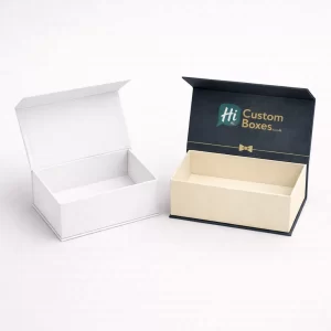 Two rectangular flip-top gift boxes shown open, featuring a plain white and a navy design.