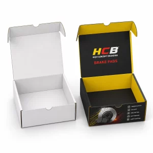 Pair of premium automotive brake pad boxes in black and blue with clean branding designs.