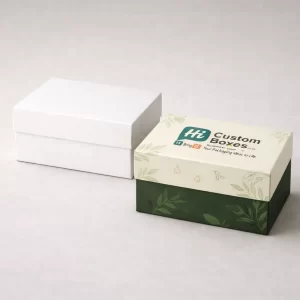 Two white and green branded slimming tea boxes featuring natural leaf designs for health products.
