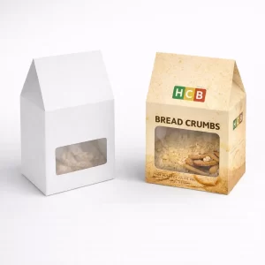 A white gable box and a tan branded box with a window showcasing panko-style breadcrumbs inside.