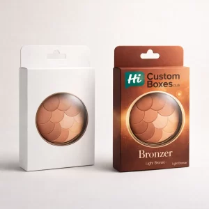 Two vertical retail boxes with hang tabs and circular windows, displaying a multi-tonal scalloped bronzer.