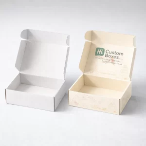 Plain white and custom-printed cream cardboard cake shipping boxes with floral patterns and a tiered cake illustration.