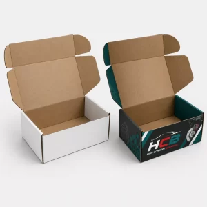 Two bespoke black and green car parts boxes featuring custom logos and automotive part graphics.