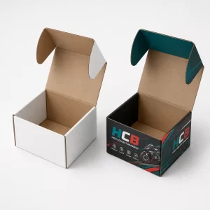 Vertical black and orange corrugated boxes designed for protecting and shipping high-quality motorcycle accessories.