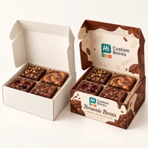 Hinged white and custom-branded brownie packaging boxes open to display a selection of four gourmet brownies.