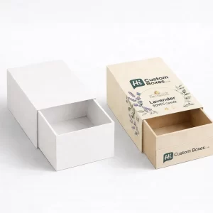 Custom soy candle boxes featuring one simple kraft design and one artistic floral branded box.