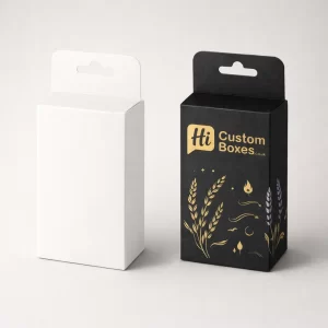 Two white retail cartons with hanging tabs, one blank and one featuring gold foil branding.