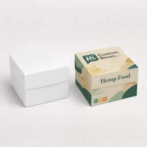 Two-piece rigid gift boxes with lids, showing a minimalist white version beside a branded botanical-print box.