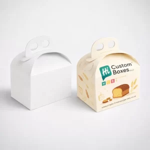 Two retail cartons with cutout windows, one plain white and one featuring yellow loaf cake branding.