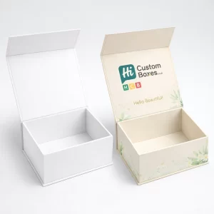 Two rigid boxes, one plain and one with elegant blue wave-patterned branding.