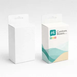 Two square white boxes, one plain and one printed with a circular window showing a garment.