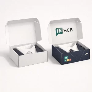 Two elegant sleeve-style drawer boxes, displaying a clean white version and a branded navy blue option.