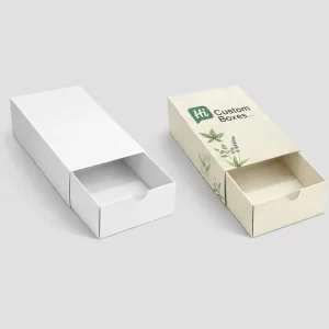 Two slide-out drawer style boxes, one minimal white and one with elegant green leaf illustrations.