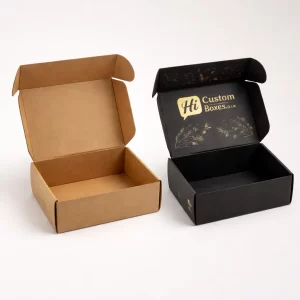 Two drawer-style slide boxes, one plain white and one featuring custom gold foil candle designs.