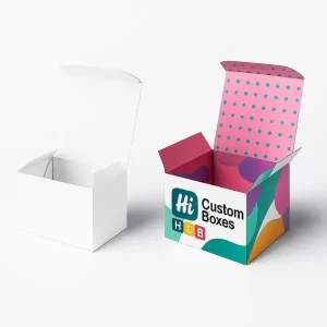 Tuck-end chocolate packaging boxes - one plain white- one printed with abstract multicolor design- Hi Custom Boxes logo- and pink polka dot interior