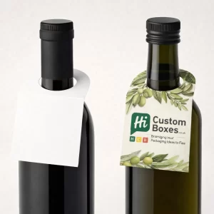 Two glass bottles with silver caps displaying white and promotional pyramid-style card neck tags for New York.