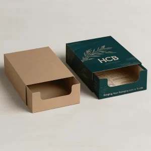 Sliding brown cardboard tray inside a green branded sleeve for premium retail product presentation.