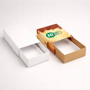 Two-piece tray and sleeve fudge boxes offering a premium sliding mechanism for high-end confectionery presentation.