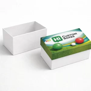 Two rectangular cardboard boxes- one plain white and one with a green lid featuring bocce balls