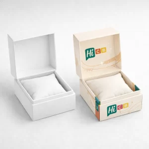 Two square hinged gift boxes shown open- displaying soft internal cushions for holding luxury watches or bracelets