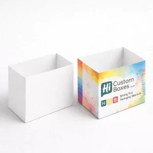 Two small rectangular pencil boxes; one is blank white and the other has a vibrant watercolour paint splash design.