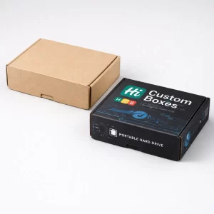 Realistic 3D mockup of a kraft mailer box beside a branded black hard drive box.
