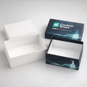 Two vertical soap dispenser boxes featuring a modern design with green botanical leaf patterns and text.