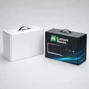 Side-by-side laptop carrying boxes with black plastic handles, shown in plain white and branded black styles.