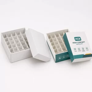 Two-piece white gift boxes featuring internal grid dividers for securing multiple small items during transit.