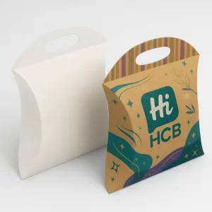 Two large pillow boxes with a top carry handle- one plain white and one colourfully decorated
