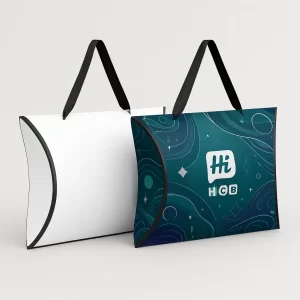 Gift pillow boxes with black ribbon handles- one white and one in dark teal pattern