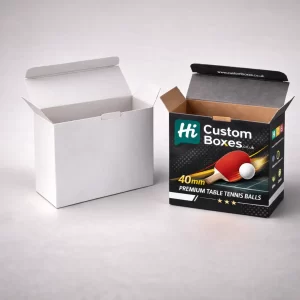 Two open cardboard tuck-end boxes, one plain white and one with a custom table tennis design.
