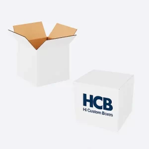 Two white corrugated shipping boxes one open with kraft interior and one closed with HCB branding