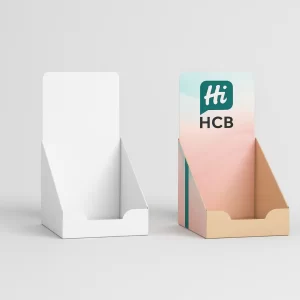 White and branded retail boxes with a punch hole hanger tab for lip balm packaging