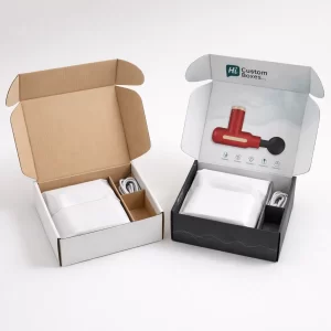 Two upright tuck-top cardboard boxes filled with wellness items, featuring one plain white and one branded.