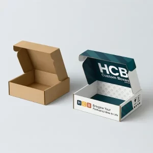 Kraft postal boxes - one plain brown- one printed with teal and white HCB branding and interior graphics