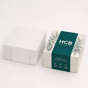 Premium two-piece rigid boxes with custom branded sleeves designed for luxury retail and high-end gift packaging.